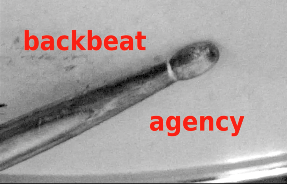 backbeat agency logo - snare drum with drum stick across it